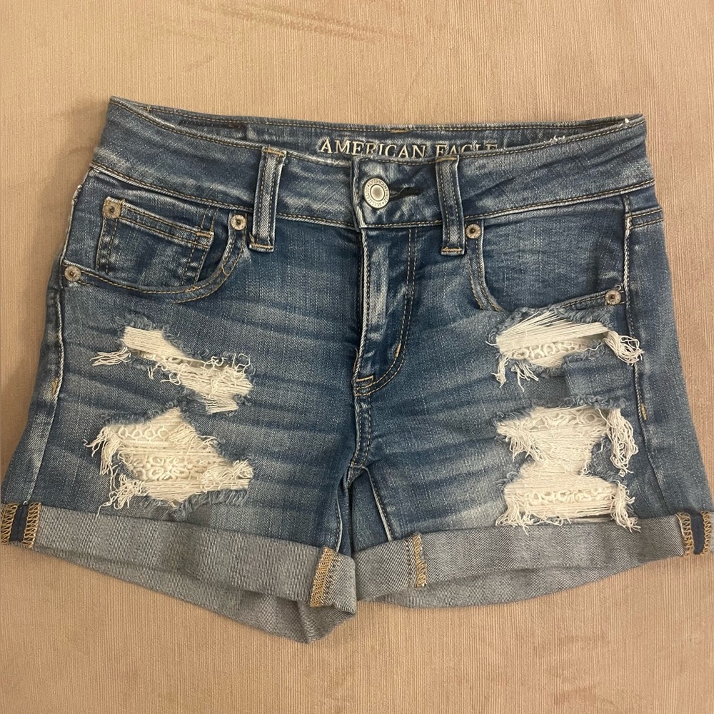 American Eagle Outfitters Blue Jean Shorts with Distressed Details